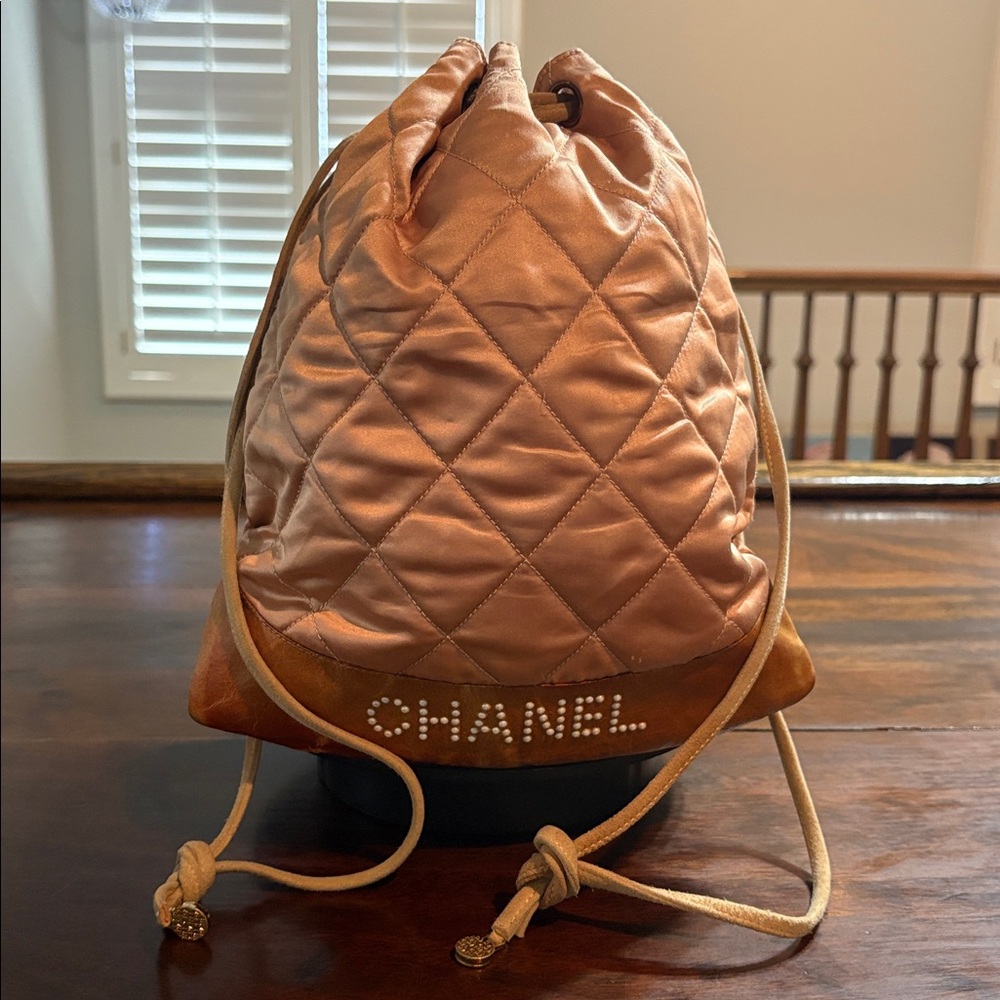 CHANEL Quilted Pink Satin Crystal Logo Backpack